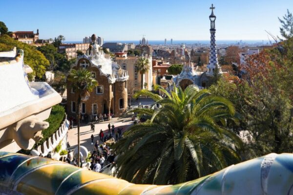 How do I avoid long lines at popular attractions in Barcelona?