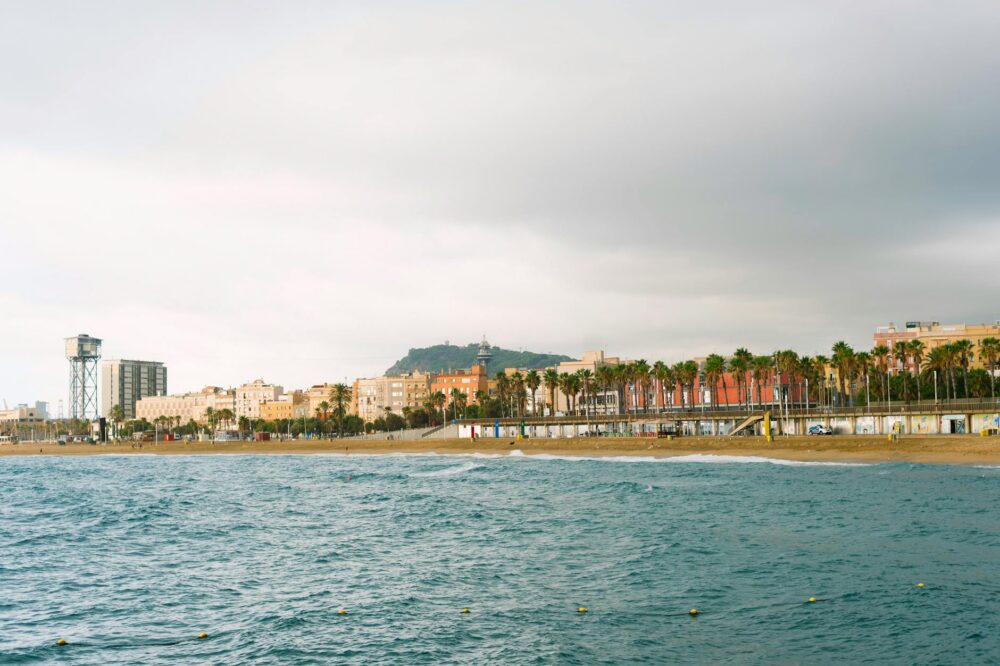 How do I get to Barceloneta Beach from the city center?