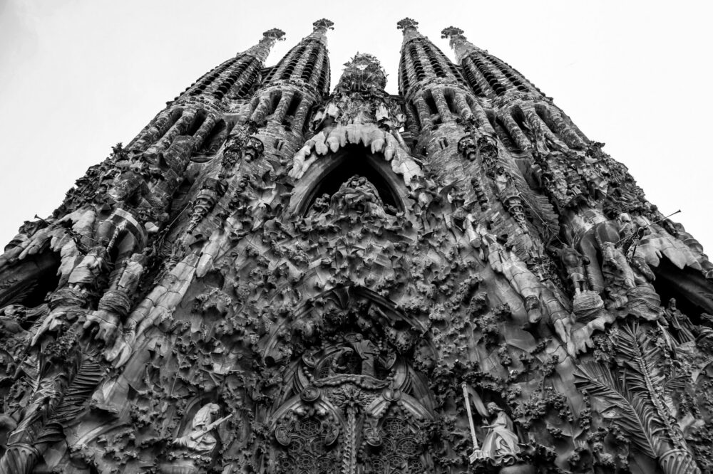 How do you avoid long lines at popular attractions like Sagrada Familia?