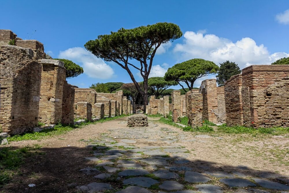 How do you get from Rome to the beach towns like Ostia?
