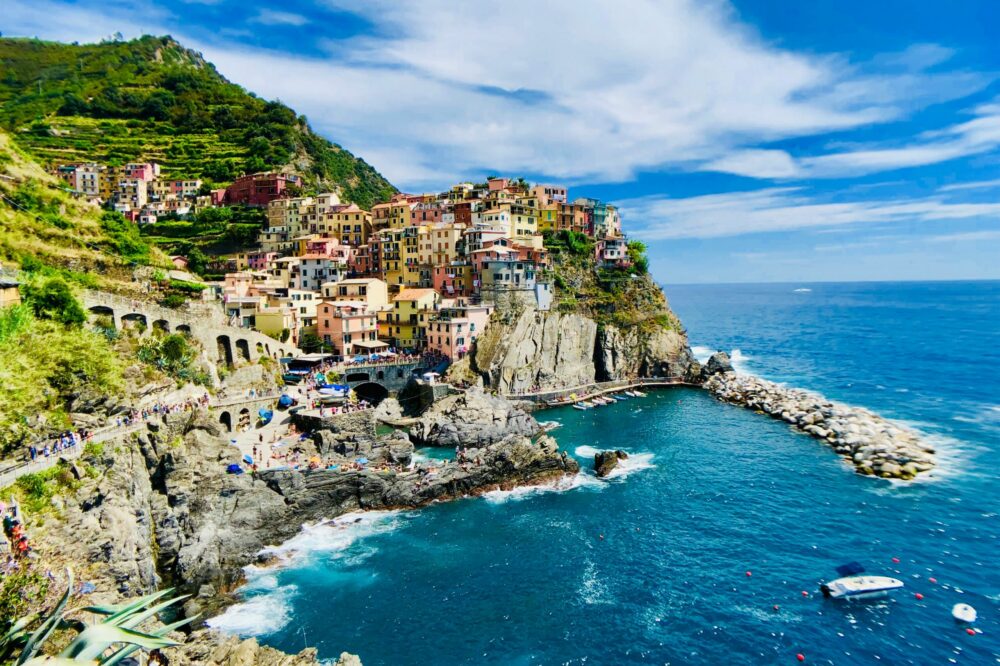 How do you get from Rome to the Cinque Terre for a scenic trip?
