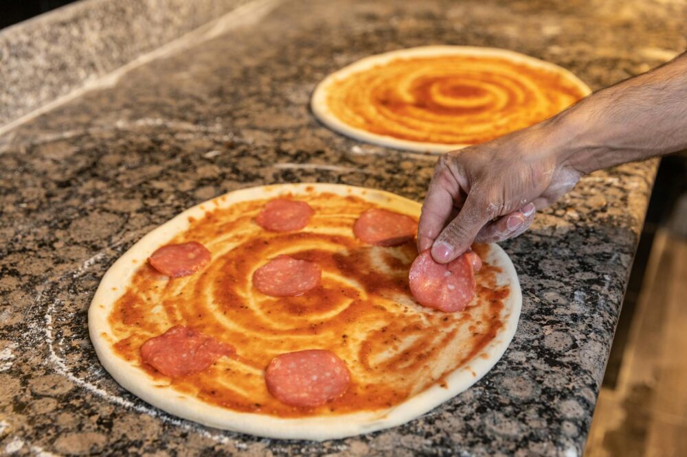 How much does a pizza cost in Naples?