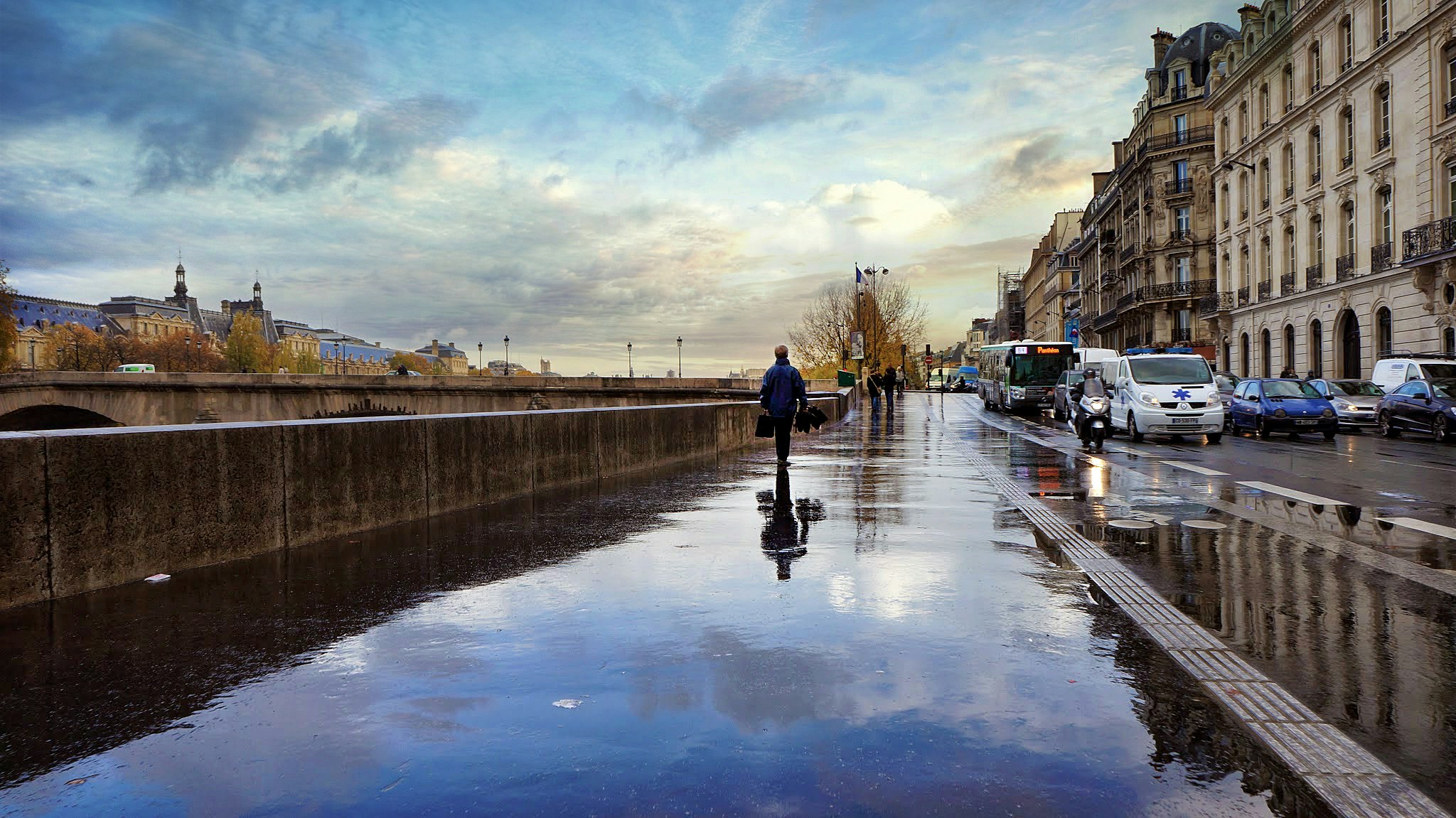 man walking beside the street