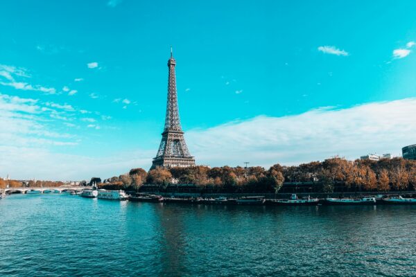 eiffel tower near body of water during daytime