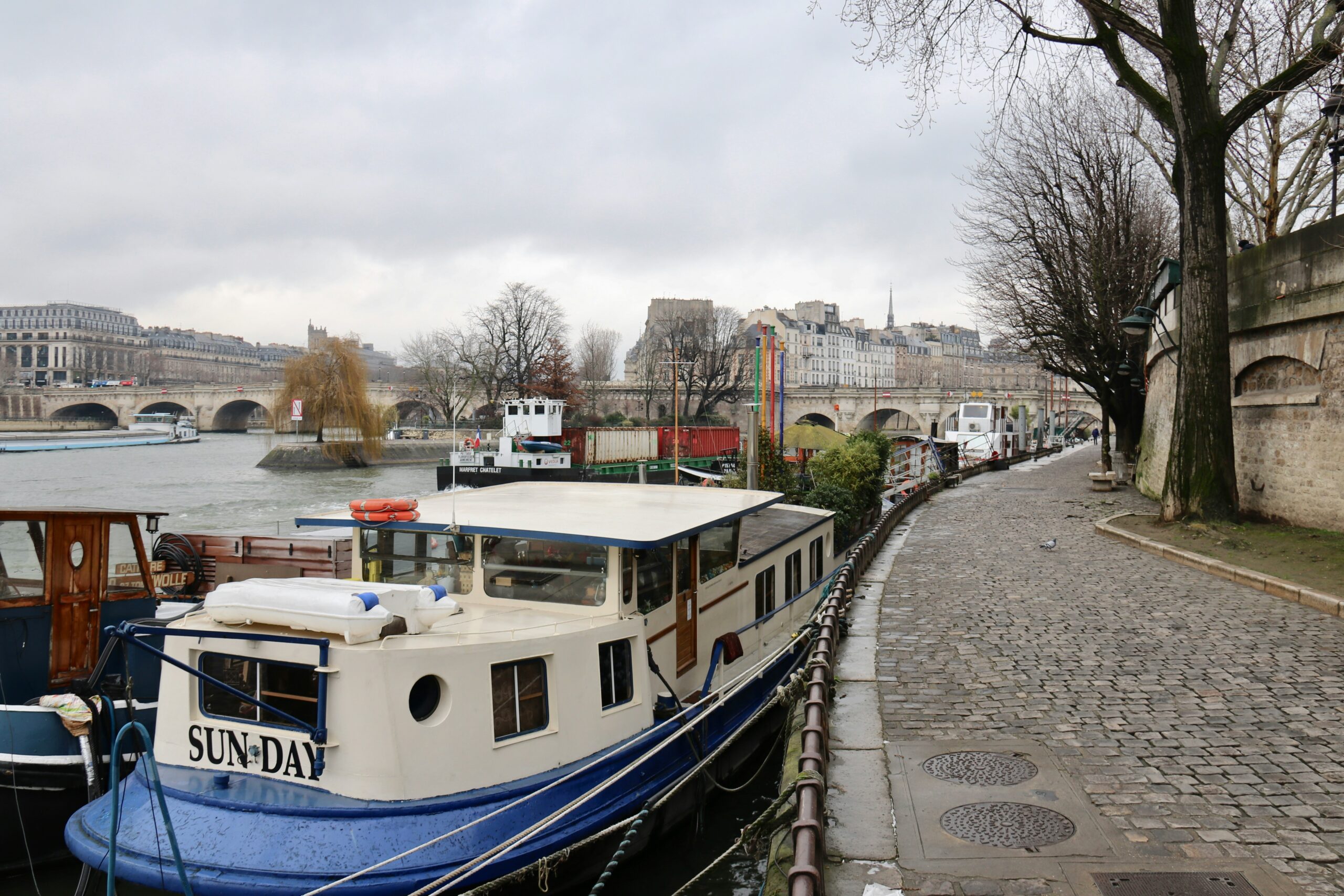 a boat docked on a river