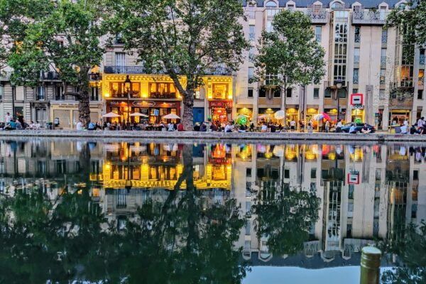 body of water near people and building