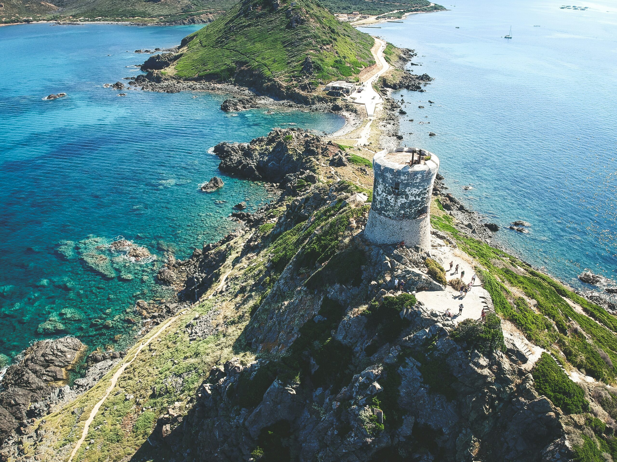 aerial photography of beach cliff and sea view