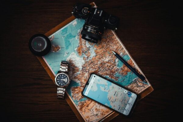 What are the best apps or websites for planning a trip to Rome?