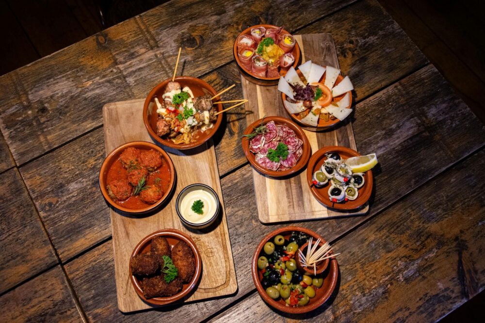 What are the best places to try authentic tapas in Barcelona?