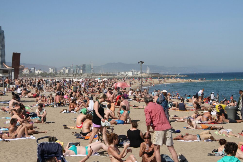 What are the best times to visit Barcelona for good weather and fewer crowds?