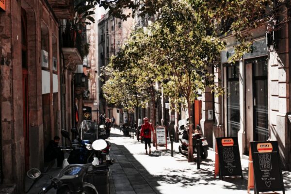 What are the best ways to get around Barcelona by bike or scooter?