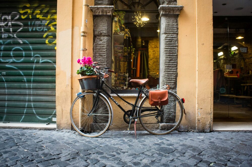 What are the options for bike rentals and cycling routes in Rome?