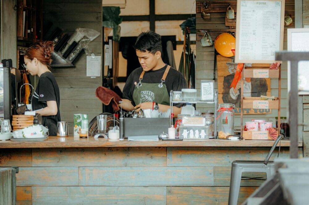 What is the difference between a coffee shop and a café in Amsterdam?