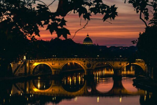 What is the dress code for visiting churches and religious sites in Rome?