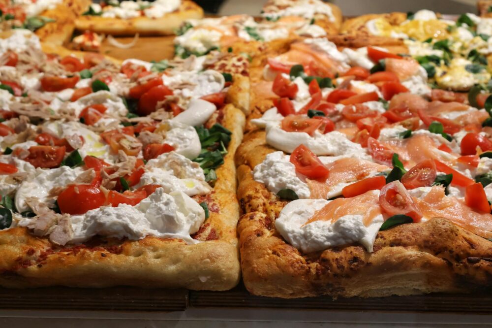 Where to find the best pizza al taglio in Rome for a quick lunch?