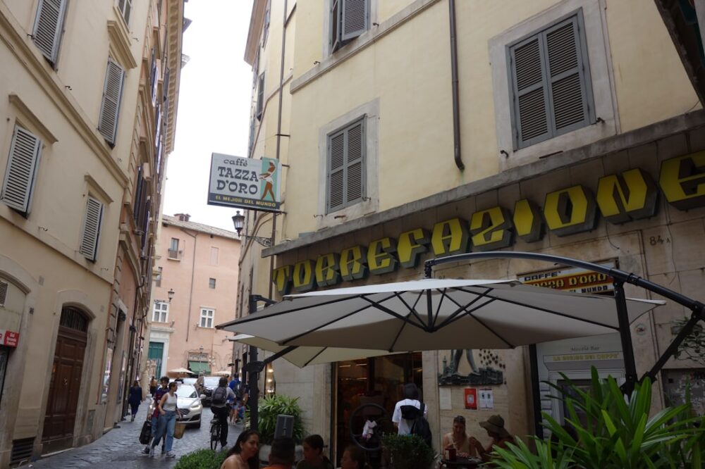 Are there hotels in Rome with electric car charging stations?