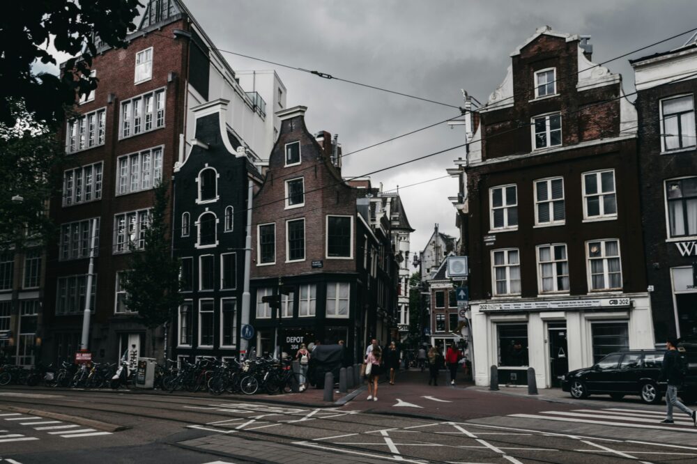 How do I apply for a PhD position at an Amsterdam university?