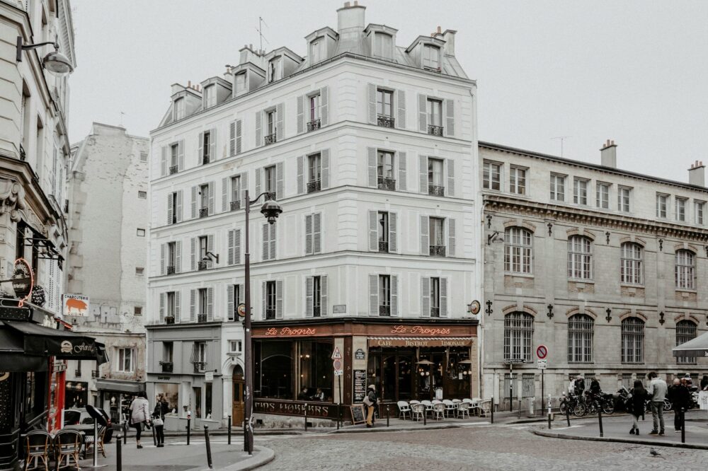 Is it better to stay in Paris or Versailles in 2026?