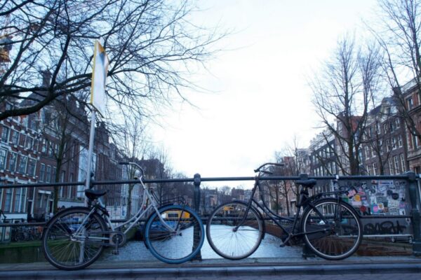 What is the housing guarantee for first-year students at Amsterdam universities?
