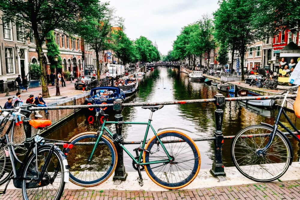 Which 5 star hotels in Amsterdam offer bike rental?