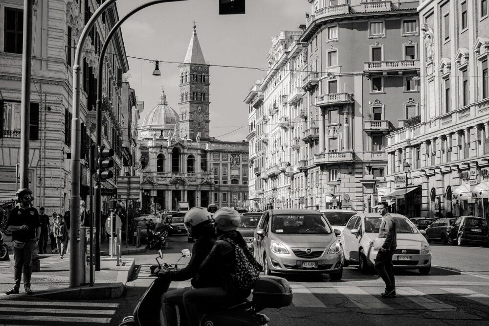 Which hotels in Rome offer a free airport transfer?